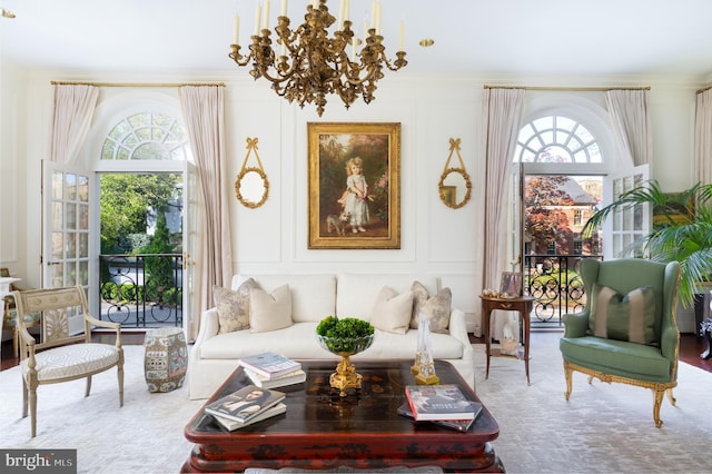 2838 Mcgill Ter NW, Washington, DC 20008 - living area featuring a chandelier, a decorative wall, and ornamental molding