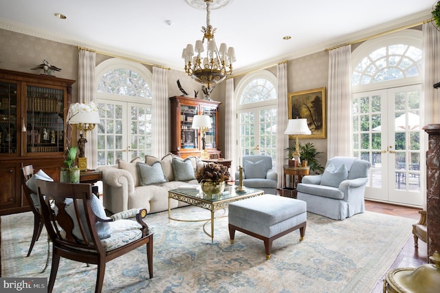 2838 Mcgill Ter NW, Washington, DC 20008 - living room with wallpapered walls, ornamental molding, a chandelier, and french doors