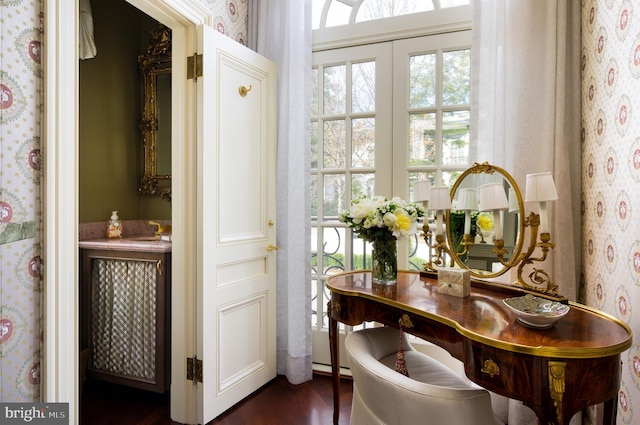 2838 Mcgill Ter NW, Washington, DC 20008 - doorway featuring wallpapered walls, plenty of natural light, and dark wood-style flooring