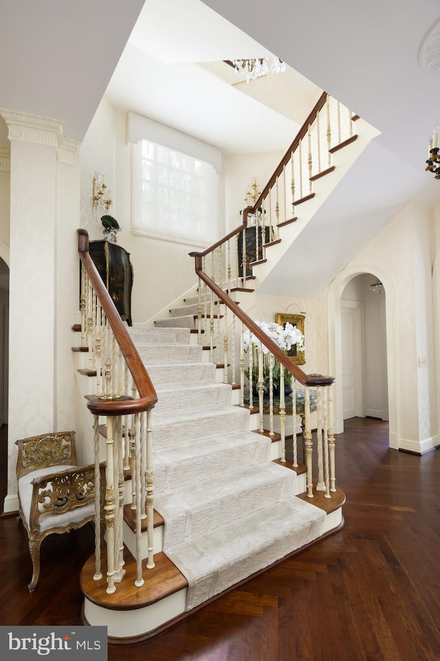 2838 Mcgill Ter NW, Washington, DC 20008 - stairs featuring arched walkways and baseboards