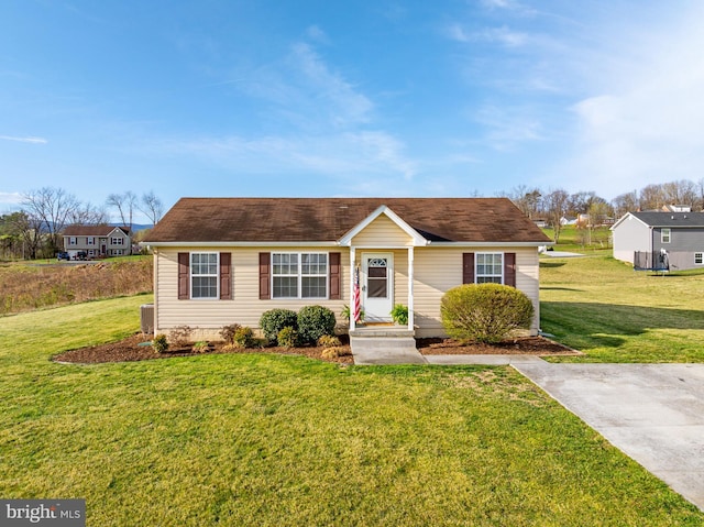 ranch-style home with a front lawn