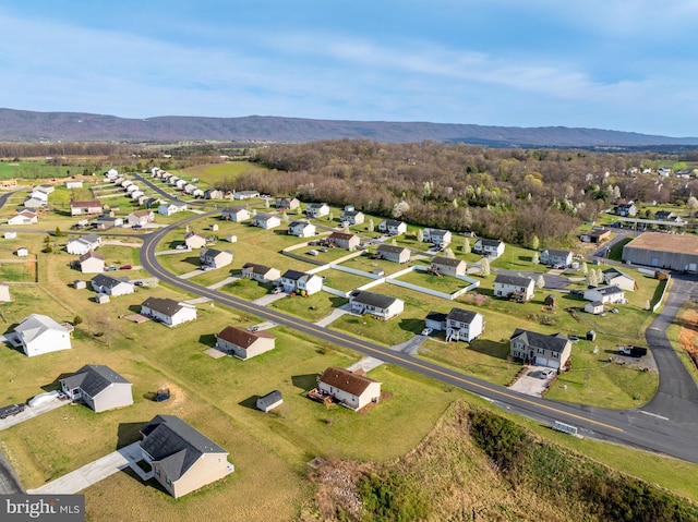birds eye view of property featuring a mountain view and a residential view