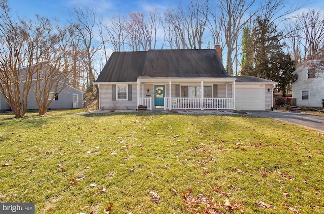 view of front of home with a front yard, a porch, a garage, a chimney, and driveway