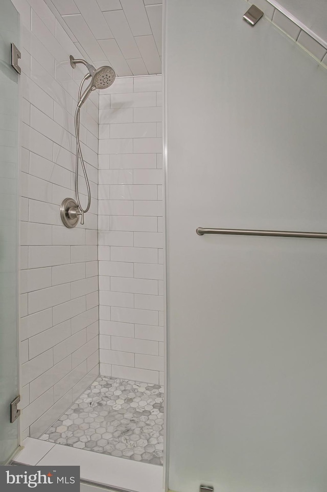 bathroom with a stall shower