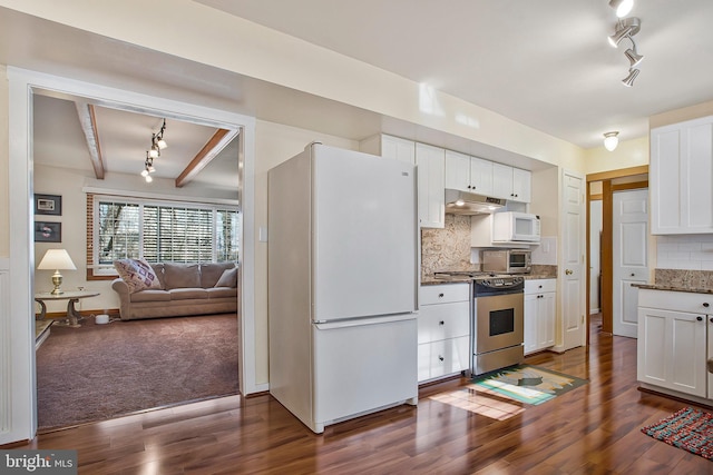 kitchen featuring white cabinetry, under cabinet range hood, dark wood-style flooring, and white appliances