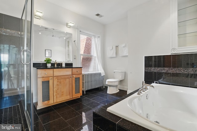 bathroom featuring radiator heating unit, toilet, baseboards, vanity, and a stall shower