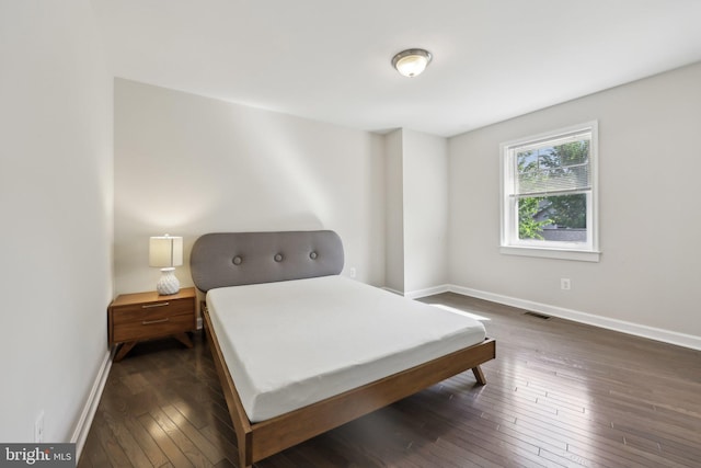 1905 S Glebe Rd, Arlington, VA 22204 - bedroom with baseboards, dark wood finished floors, and visible vents