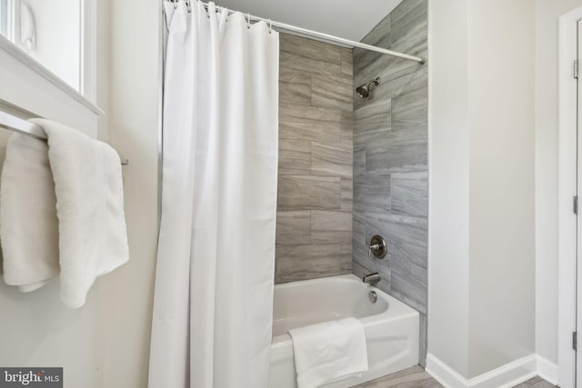 1905 S Glebe Rd, Arlington, VA 22204 - bathroom with baseboards and shower / tub combo with curtain