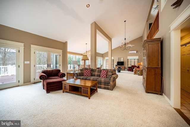 1909 Marsh Hill Rd, Mc Henry, MD 21541 - living room featuring baseboards, carpet floors, high vaulted ceiling, and a chandelier