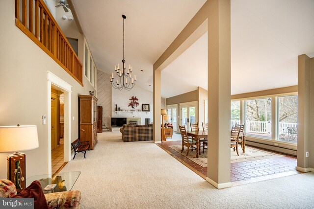 1909 Marsh Hill Rd, Mc Henry, MD 21541 - dining space featuring light colored carpet, a high ceiling, a baseboard heating unit, and a chandelier