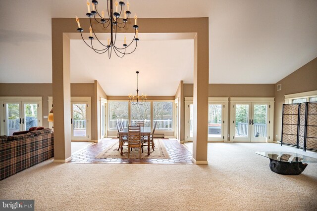 1909 Marsh Hill Rd, Mc Henry, MD 21541 - carpeted dining space with french doors, plenty of natural light, high vaulted ceiling, and a chandelier