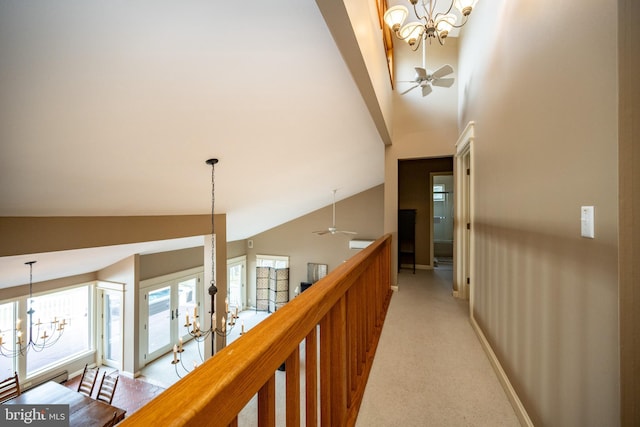 1909 Marsh Hill Rd, Mc Henry, MD 21541 - hall featuring a notable chandelier, high vaulted ceiling, baseboards, and light carpet