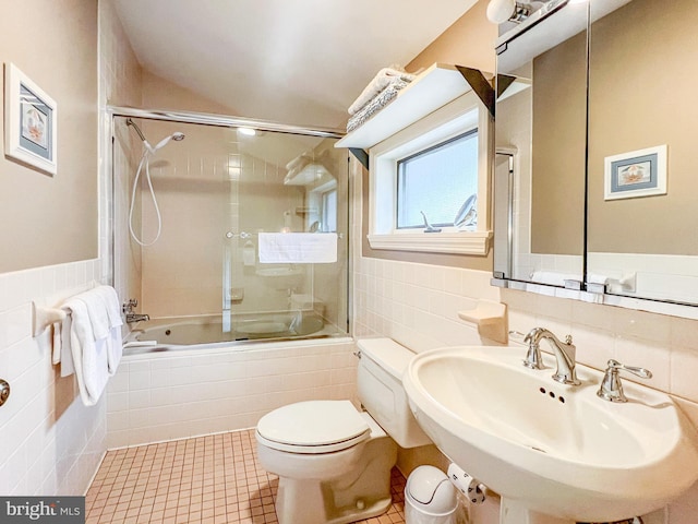 1909 Marsh Hill Rd, Mc Henry, MD 21541 - bathroom featuring a sink, toilet, tiled shower / bath combo, and tile walls