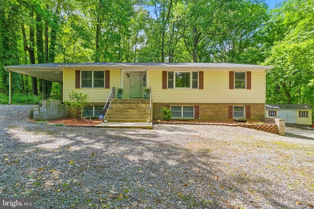 7000 Burch Hill Rd, Brandywine, MD 20613 - view of front of property with gravel driveway and a carport