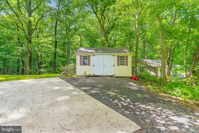 7000 Burch Hill Rd, Brandywine, MD 20613 - view of shed featuring a view of trees