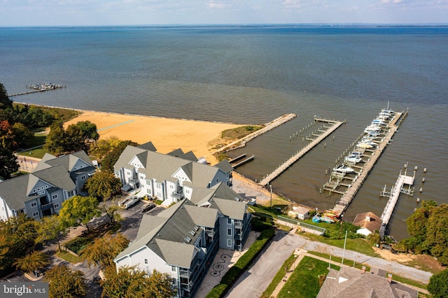 aerial view featuring a residential view and a water view
