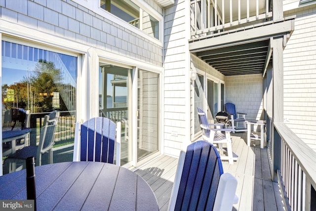 deck with outdoor dining space