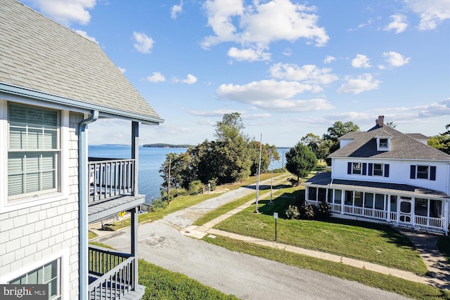 exterior space with a water view