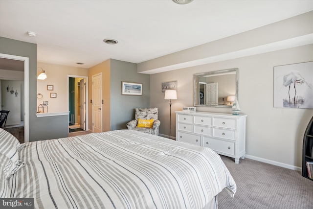 bedroom featuring carpet floors, baseboards, and visible vents