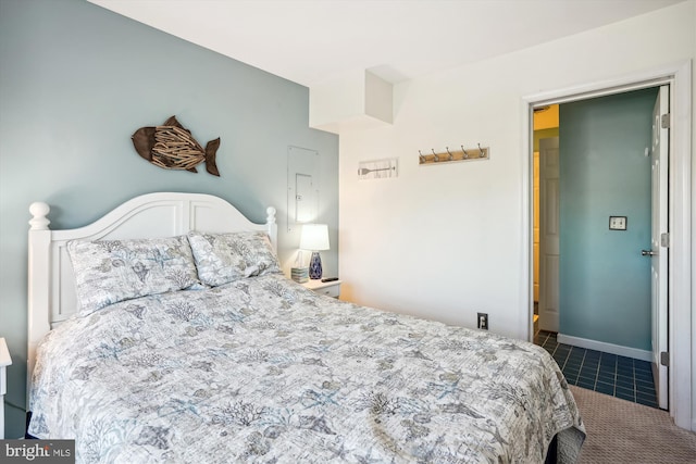 tiled bedroom with baseboards