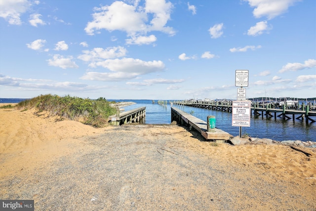 view of dock with a water view