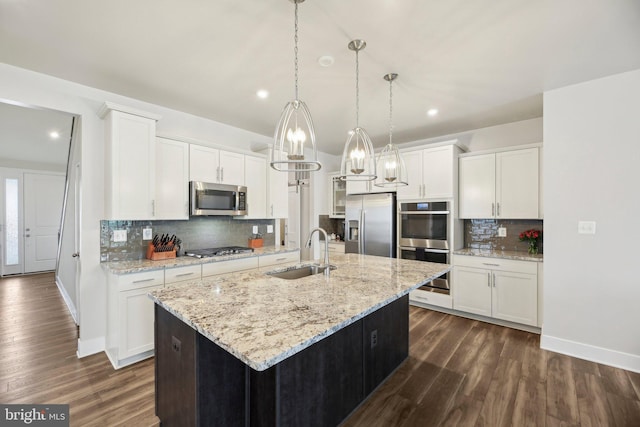 2101 Gails Ln, Mount Airy, MD 21771 - kitchen with a sink, backsplash, dark wood finished floors, and stainless steel appliances