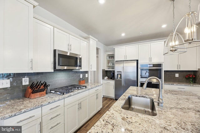2101 Gails Ln, Mount Airy, MD 21771 - kitchen featuring stainless steel appliances, white cabinetry, a sink, and backsplash