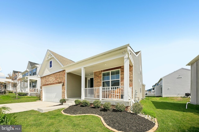 2101 Gails Ln, Mount Airy, MD 21771 - view of front of house featuring driveway, stone siding, a front lawn, a porch, and a garage