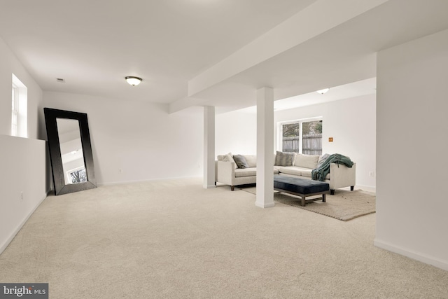 sitting room with baseboards, carpet flooring, and visible vents