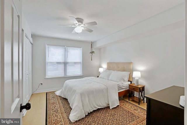 13663 Orchard Dr Unit 3663, Clifton, VA 20124 - bedroom with light wood-style floors, a ceiling fan, and baseboards