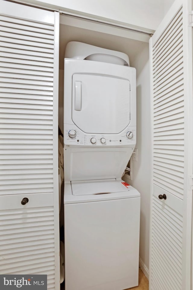 13663 Orchard Dr Unit 3663, Clifton, VA 20124 - laundry room featuring stacked washer and clothes dryer