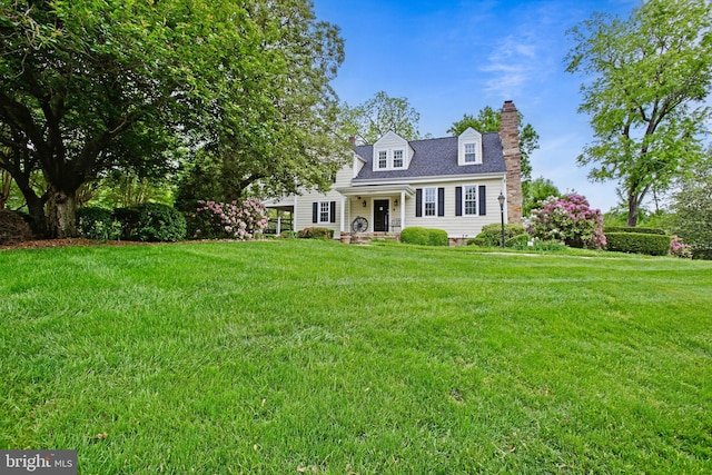 13663 Orchard Dr Unit 3663, Clifton, VA 20124 - cape cod home featuring a front lawn and a chimney