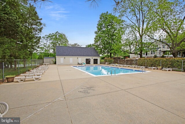 13663 Orchard Dr Unit 3663, Clifton, VA 20124 - community pool with a patio and fence
