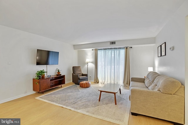 13663 Orchard Dr Unit 3663, Clifton, VA 20124 - living room with wood finished floors and baseboards