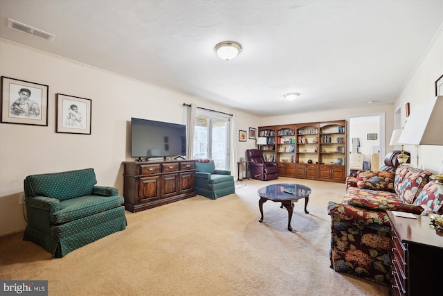 living room featuring visible vents and carpet