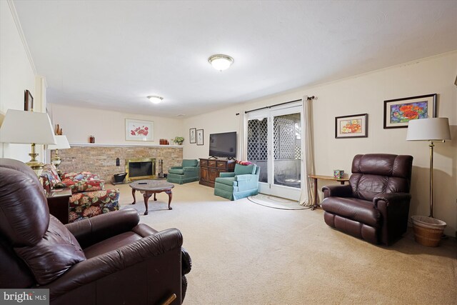 carpeted living room featuring a brick fireplace