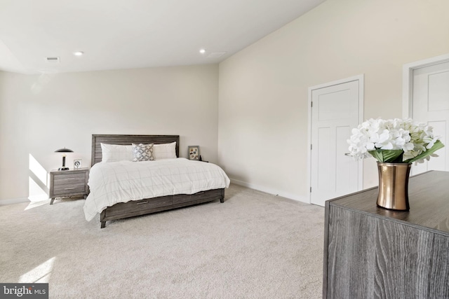 bedroom featuring visible vents, vaulted ceiling, carpet floors, baseboards, and recessed lighting