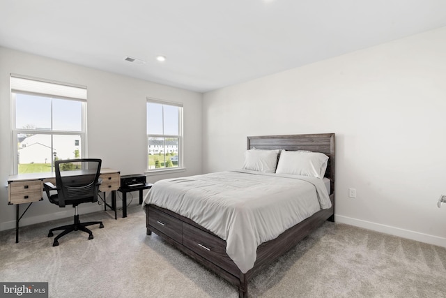 bedroom with recessed lighting, baseboards, visible vents, and light carpet