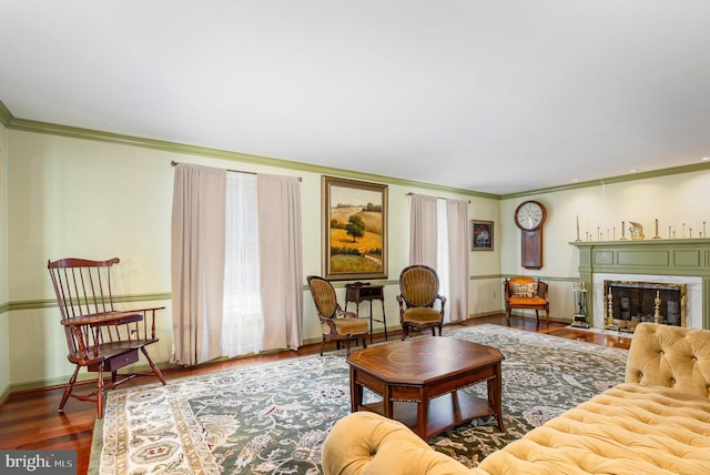 4300 Valleyview Rd, Harrisburg, PA 17112 - living room with crown molding, baseboards, wood finished floors, and a fireplace with flush hearth