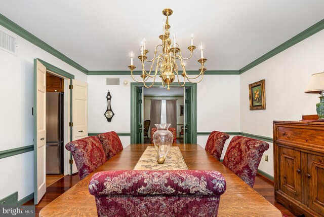 4300 Valleyview Rd, Harrisburg, PA 17112 - dining room with a chandelier, ornamental molding, wood finished floors, and baseboards