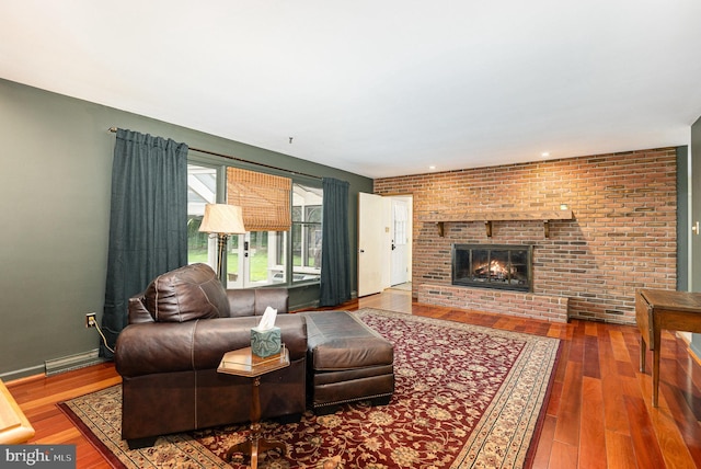 4300 Valleyview Rd, Harrisburg, PA 17112 - living room featuring wood finished floors, a fireplace, and baseboards