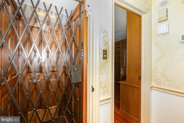 4300 Valleyview Rd, Harrisburg, PA 17112 - elevator with wallpapered walls and wainscoting