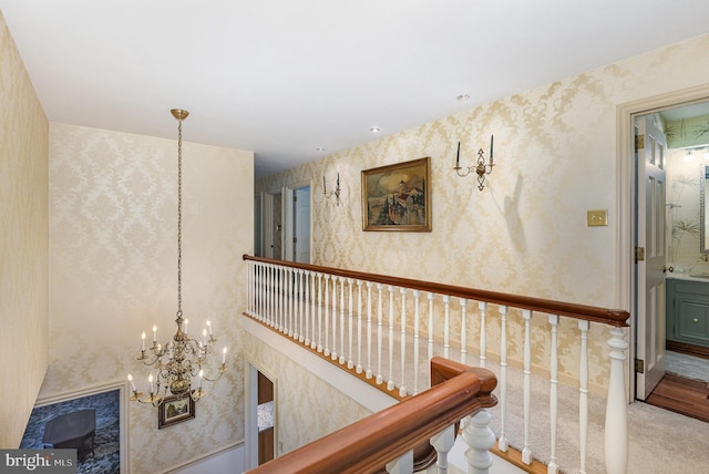 4300 Valleyview Rd, Harrisburg, PA 17112 - hall with wallpapered walls, a chandelier, and carpet