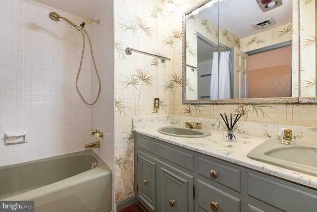 4300 Valleyview Rd, Harrisburg, PA 17112 - bathroom with wallpapered walls, double vanity, and shower / tub combo