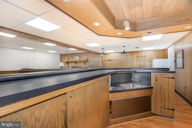 4300 Valleyview Rd, Harrisburg, PA 17112 - indoor wet bar with light wood-style flooring, wooden walls, a paneled ceiling, and recessed lighting