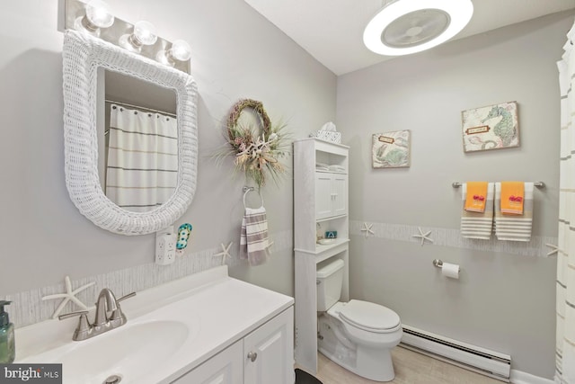 2818 Tern Dr Unit 9, Ocean City, MD 21842 - full bathroom with toilet, vanity, and baseboard heating