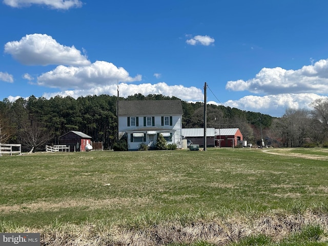 6637 Elton Dennis Rd, Willards, MD 21874 - exterior space featuring a lawn and a view of trees