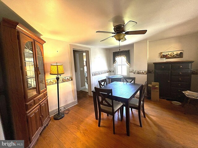 6637 Elton Dennis Rd, Willards, MD 21874 - dining area featuring wood finished floors, baseboards, and ceiling fan