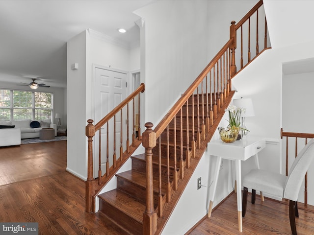 staircase with recessed lighting, ceiling fan, and wood finished floors