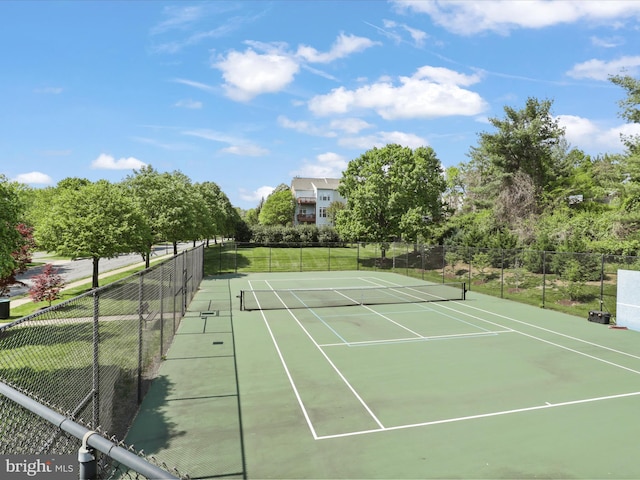 view of sport court featuring community basketball court and fence